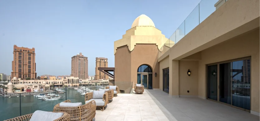 Luxury penthouse terrace with marina and city views