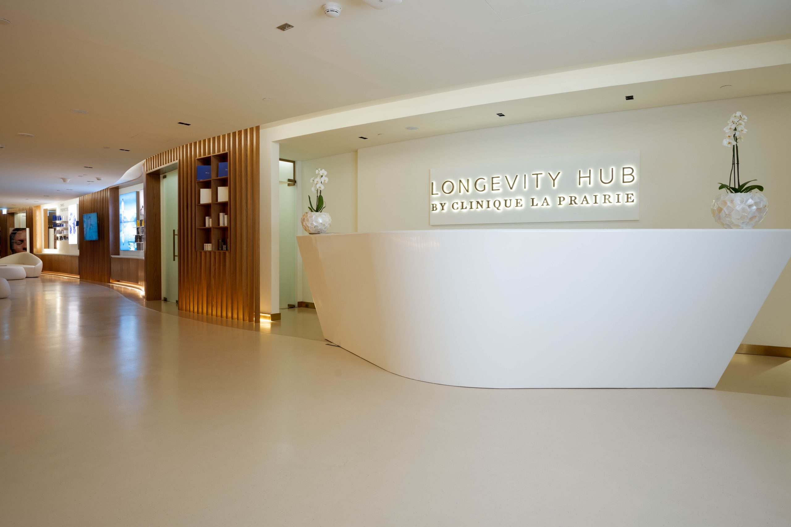 Modern clinic reception with sleek white desk