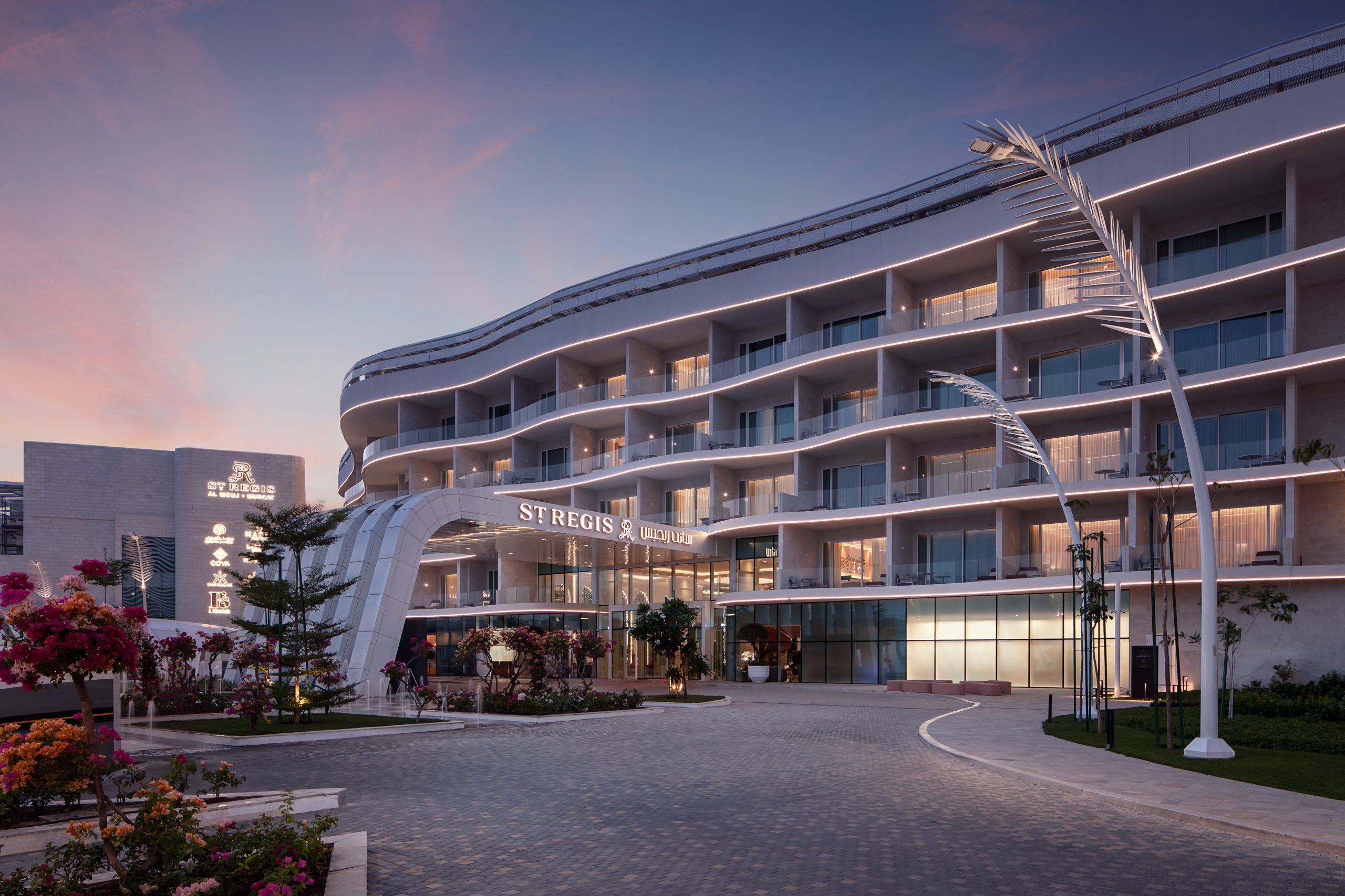 St. Regis Al Mouj Muscat Resort entrance at dusk