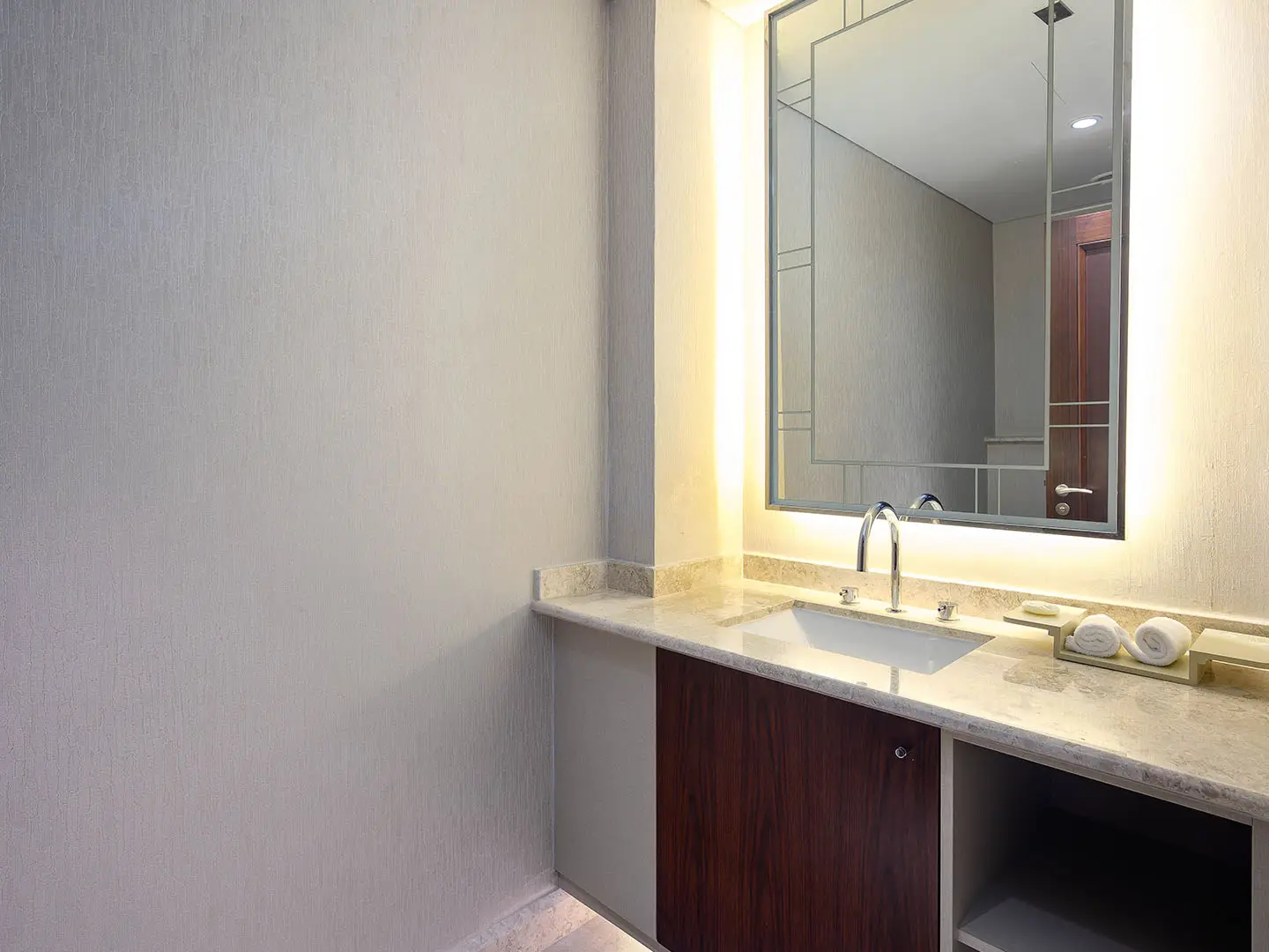 Modern bathroom vanity with mirror and marble counter