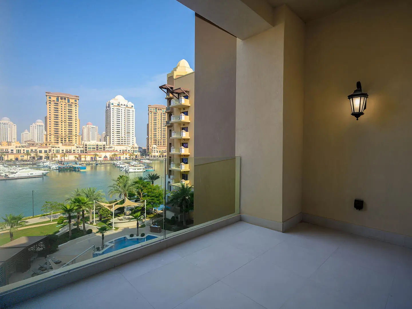 Balcony view overlooking marina and buildings