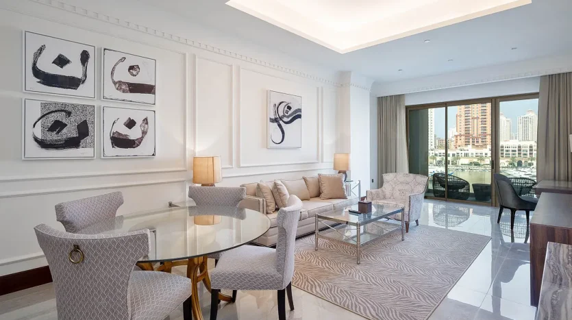 Spacious living room with marina view balcony