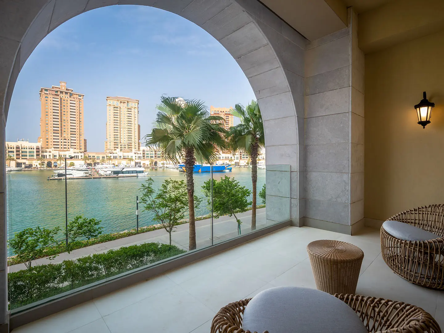 Outdoor patio with pool and city skyline