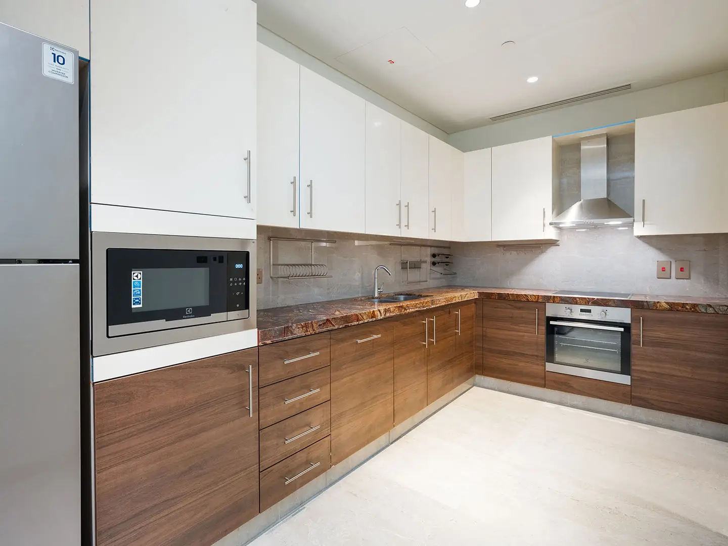 White cabinets meet wood lower units