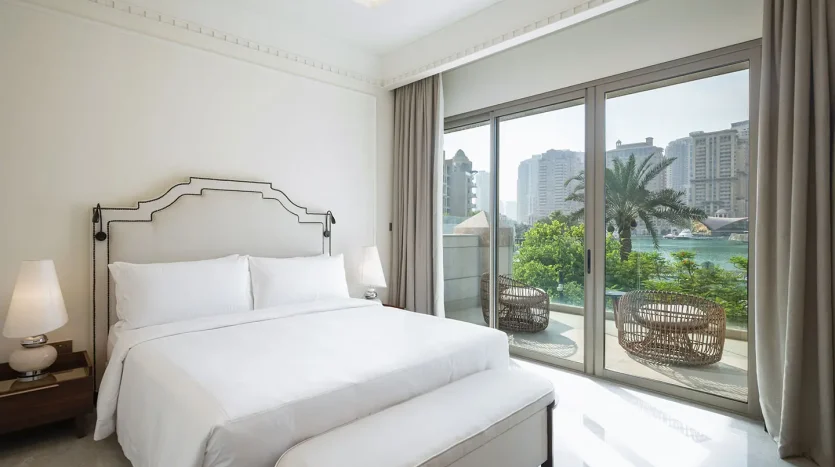 Elegant room overlooking yachts and skyline