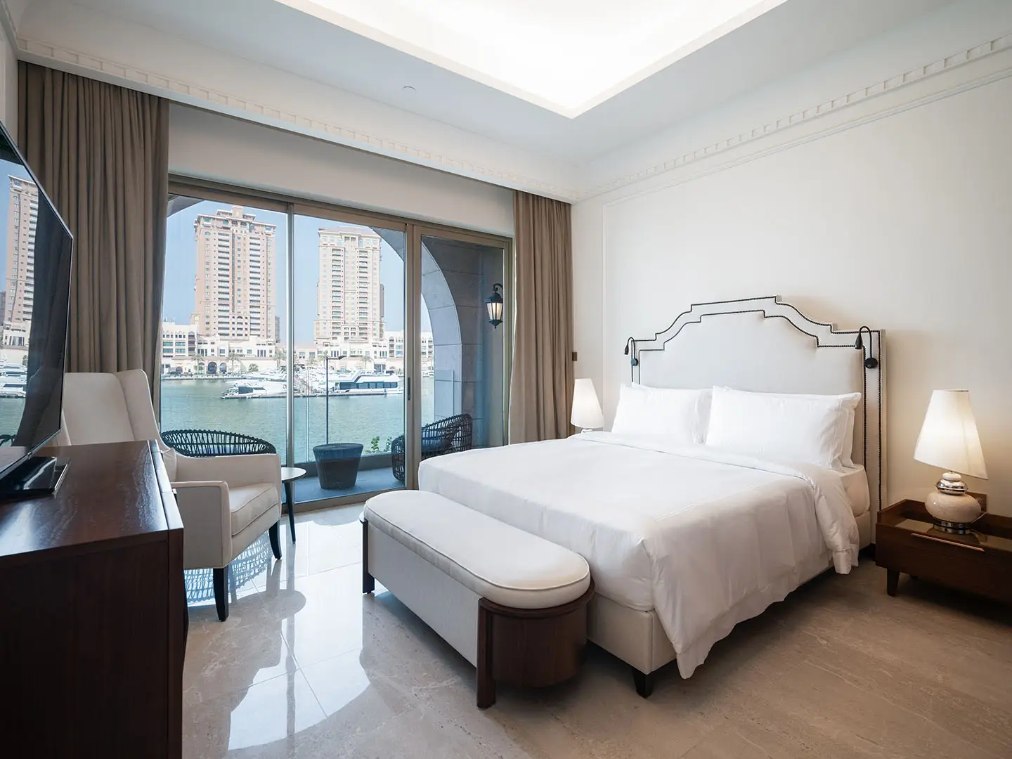 Peaceful suite with warm light and cityscape