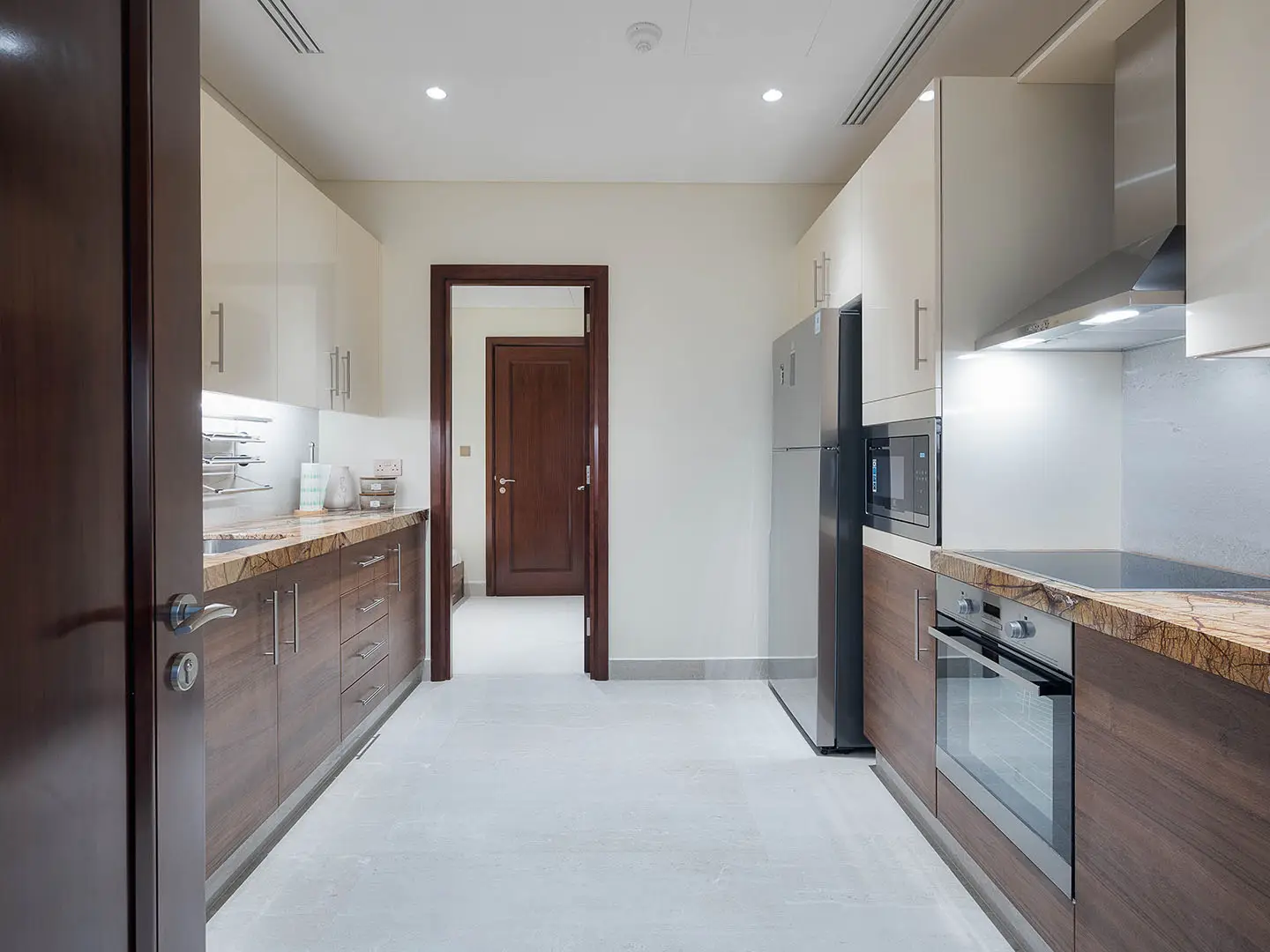 Minimalist kitchen with wood finishes