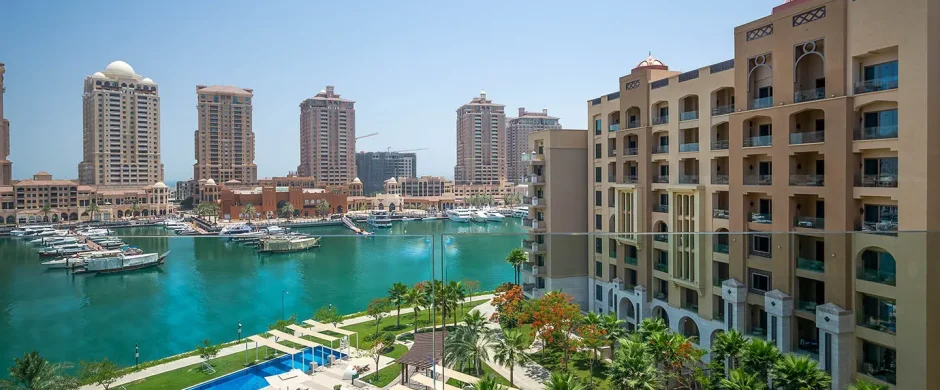 Marina with boats and pool in foreground