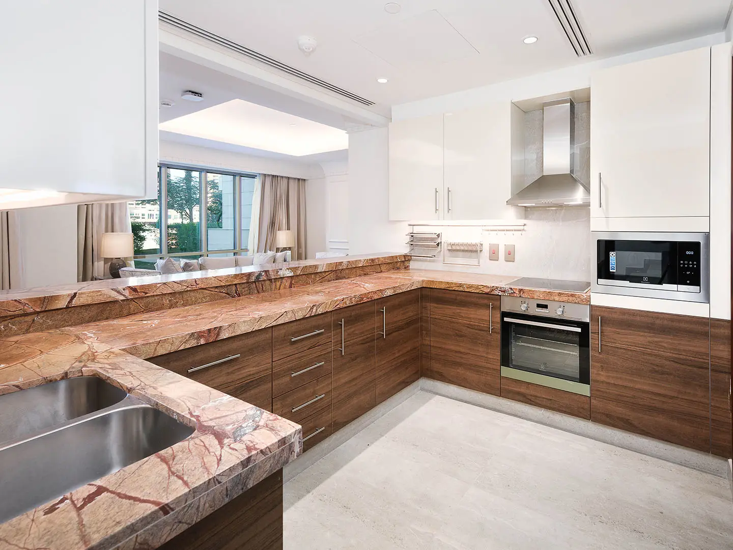 Clean kitchen with white upper cabinets