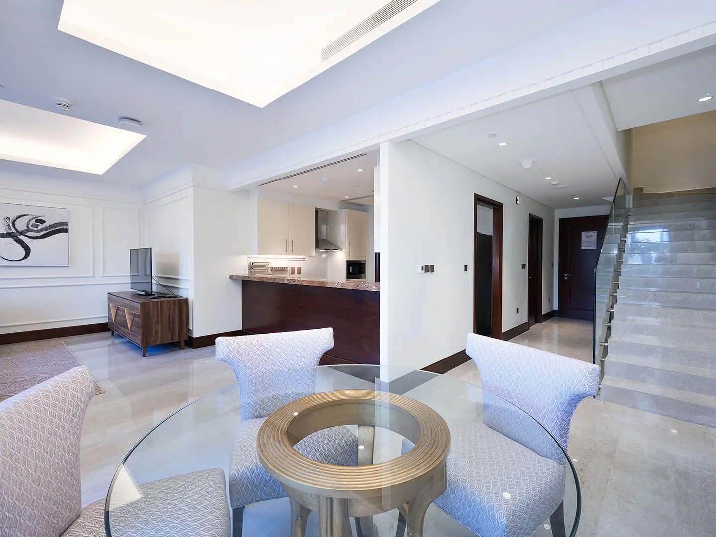 Open layout with kitchen and stairs