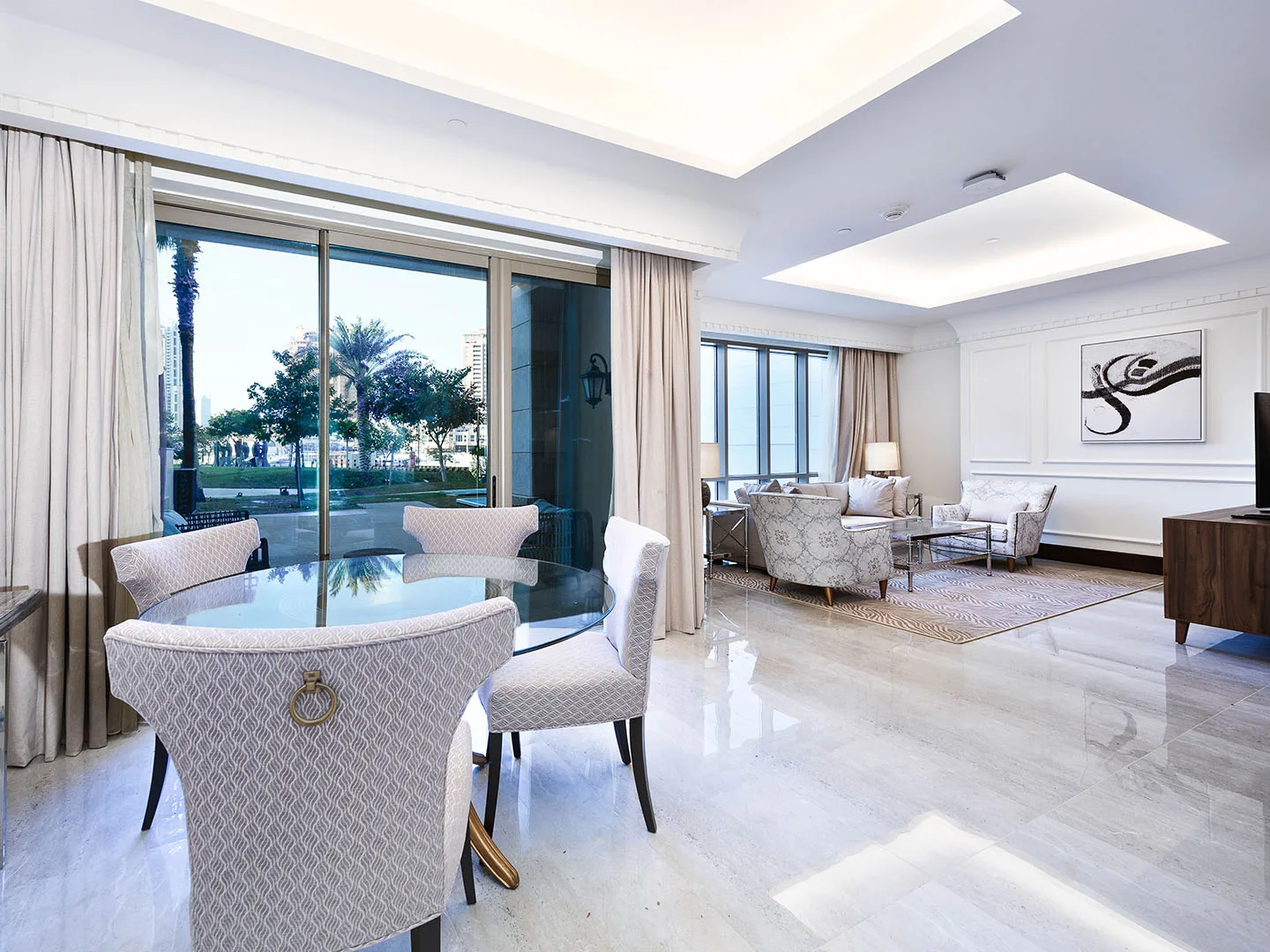 Sunlit space with glass table set