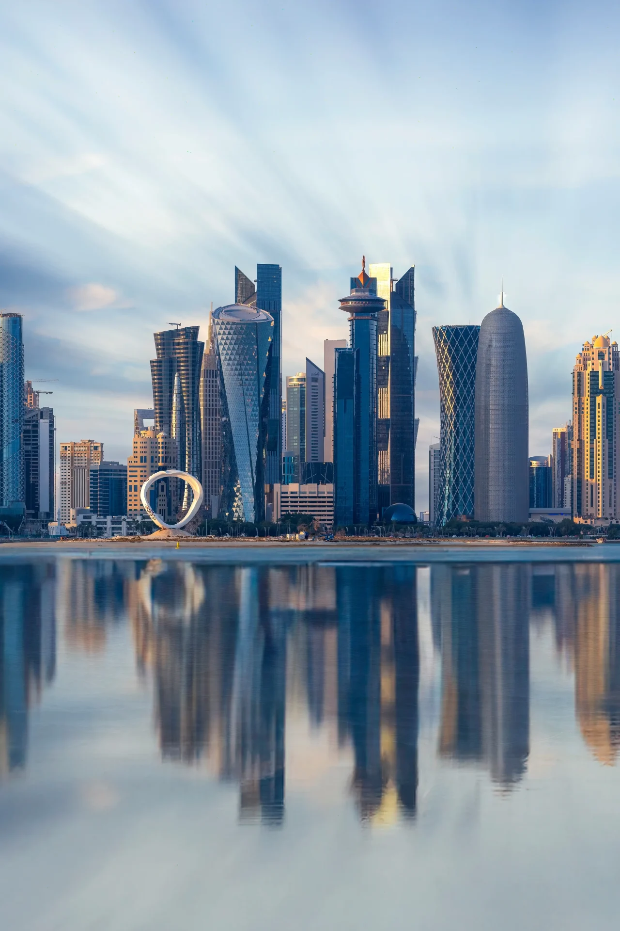 Modern Doha skyline reflected in the water