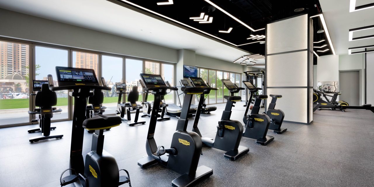 Spacious gym with modern exercise equipment