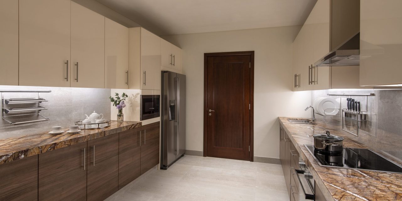 Modern kitchen with wood and cream cabinets